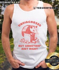 Funny undiagnosed but something ain't right raccoon tank top featuring a quirky raccoon graphic on a casual wear.