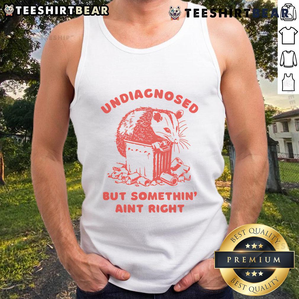 Funny undiagnosed but something ain't right raccoon tank top featuring a quirky raccoon graphic on a casual wear.