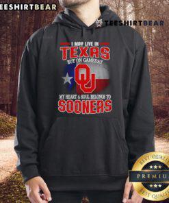 Person wearing a Oklahoma Sooners hoodie, showcasing team spirit on gameday, despite living in Texas.