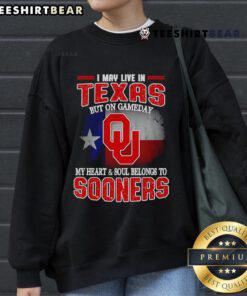 Alt Text: Oklahoma Sooners sweatshirt with 'Good I May Live In Texas But On Gameday My Heart Belongs To Oklahoma' text.