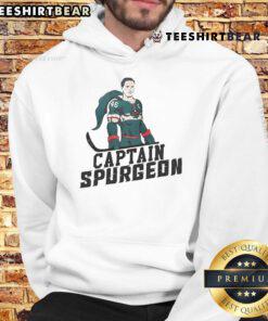 Good Matt Boldy, Captain Spurgeon, and Marco Rossi wearing stylish hoodies, showcasing team spirit and hockey fashion.