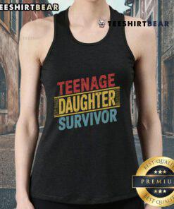 Teenage daughter wearing a retro tank top, celebrating Father's Day with a dad joke, highlighting family love and humor.
