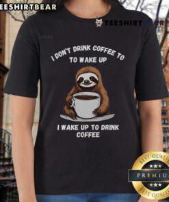 Happy sloth enjoying coffee, featured on a ladies tee, perfect for casual wear and coffee lovers.
