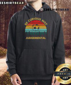 Alt Text: Vintage sunset hoodie featuring Be Curious, Not Judgmental inspirational quote for football lovers.