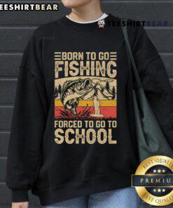 Vintage sweatshirt featuring 'Born to Go Fishing, Forced to Go to School' design, perfect for fishing enthusiasts.