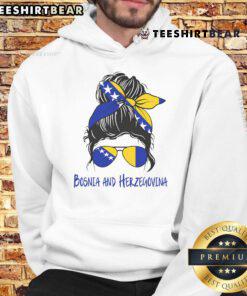 Smiling Bosnian girl wearing a cozy hoodie, representing Bosniaks culture in Bosnia and Herzegovina.
