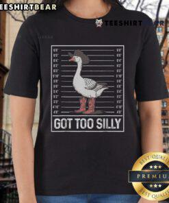 Stylish cowgirl boots paired with a 'Silly Goose' ladies tee, perfect for casual outings and country-themed events.