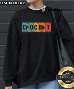 Colorful crochet periodic elements sweatshirt showcasing funny chemistry designs for science enthusiasts.