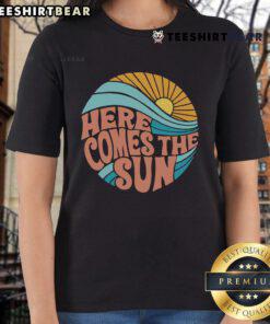 Nice Here Comes The Sun ladies tee featuring a vibrant sun graphic and soft fabric, perfect for casual summer wear.