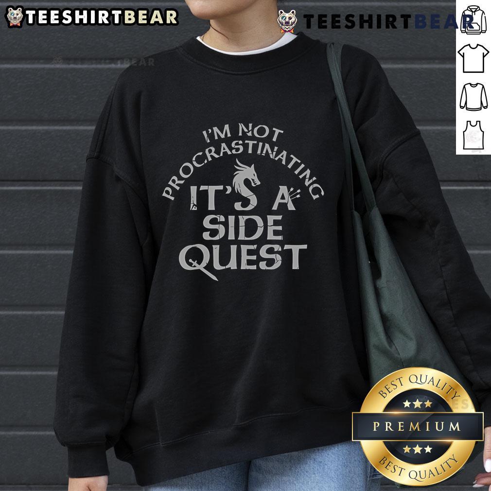 Cozy 'Nice, I'm Not Procrastinating, It's A Side Quest' sweatshirt perfect for gamers and procrastinators alike.