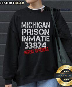 Alt Text: Inmate 33824 wearing a Nice Michigan prisoner sweatshirt, showcasing prison style and inmate identity.