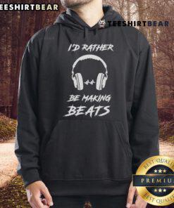 Music producer DJ wearing a 'Rather Be Making Beats' hoodie in a vibrant studio, showcasing music production creativity.