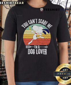 Retro ladies tee featuring Snoopy with 'You Can't Scare Me, I'm a Dog Lover' slogan, perfect for dog lovers and fans.
