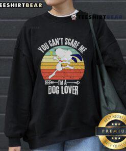 Retro Snoopy sweatshirt with 'You Can't Scare Me, I'm a Dog Lover' slogan, perfect for dog lovers and fans.