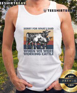 Nice Sorry For What I Said When We Were Working Cattle Tank Top featuring a humorous ranch-themed design for cowboys.