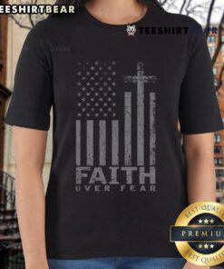 Patriotic American ladies tee with USA flag and 'Faith Over Fear' prayer design, perfect for expressing national pride.