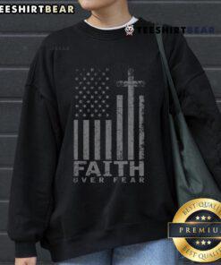 Patriotic American sweatshirt featuring the USA flag and 'Faith Over Fear' design, perfect for expressing pride.