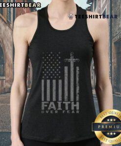 Patriotic American tank top featuring the USA flag and 'Faith Over Fear' prayer design for a stylish, uplifting look.