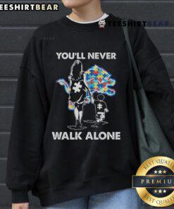 Blue Detroit Lions sweatshirt with 'You'll Never Walk Alone' slogan, perfect for fans showing team spirit.