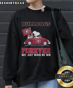 Official Bulldog Forever sweatshirt featuring Snoopy car design, perfect for fans celebrating team spirit all year round.