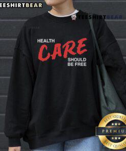 Official Health Care Should Be Free sweatshirt featuring bold text design in a comfortable fit, promoting healthcare accessibility.