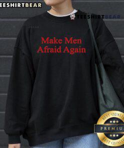 Justine Bateman 'Make Men Afraid Again' sweatshirt featuring bold text and stylish design, perfect for casual wear.
