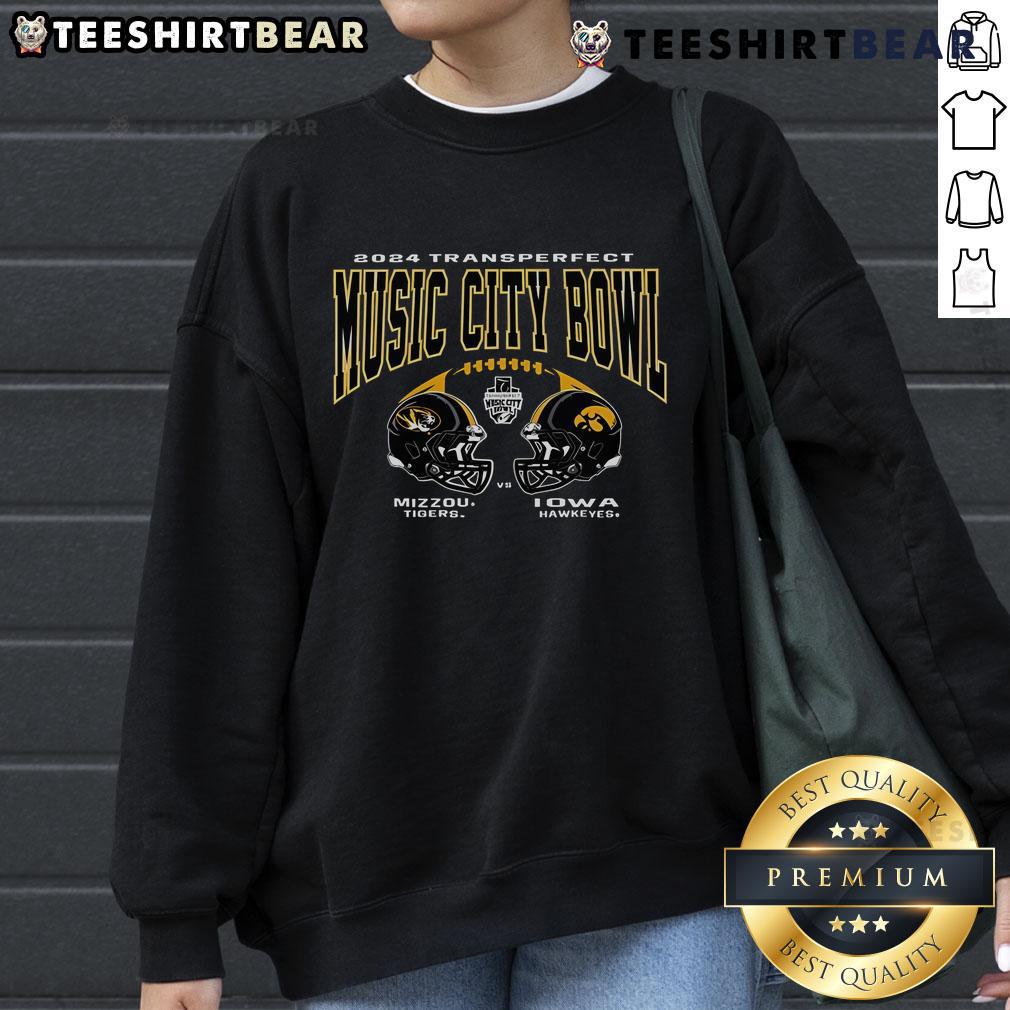 Alt Text: Official Mizzou Tigers vs Iowa Hawkeyes 2024 TransPerfect Music City Bowl football helmet sweatshirt design.