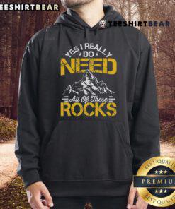 Geology lover wearing 'Need These Rocks' hoodie, perfect for expert geologists and rock enthusiasts.