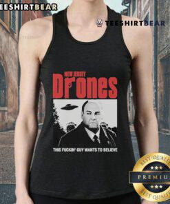 Official New Jersey Drones tank top featuring 'This Fckin Guy Wants To Believe' graphic design for casual wear.