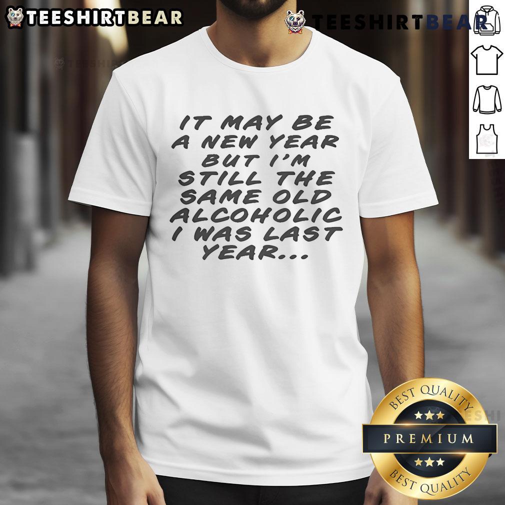 Official It May Be A New Year But I'M Still The Same Old Alcoholic T-Shirt design featuring bold text and playful graphics.