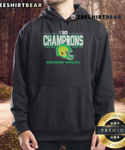 Alt Text: Oregon Ducks 2024 Big Ten Football Conference Champions hoodie displayed in a locker room setting.