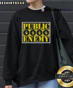 Alt Text: Official Public Enemy yellow logo sweatshirt featuring bold graphics and a stylish design, perfect for fans.