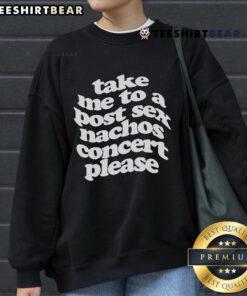 Cozy 'Take Me To A Post-Sec Nachos Concert Please' sweatshirt featuring vibrant colors and a stylish design for music lovers.