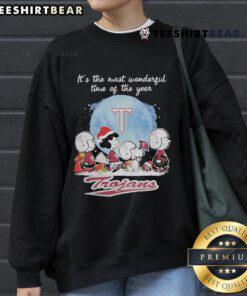 Official Troy Trojans Christmas sweatshirt featuring Peanut characters, perfect for holiday cheer and team spirit.
