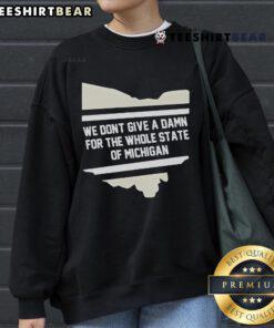 Official 'We Dont Give A Damn For The Whole State Of Michigan' sweatshirt displayed on a neutral background.