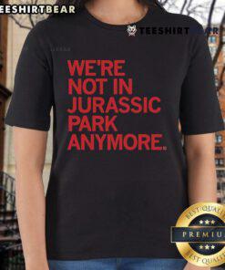Official 'We're Not In Jurassic Park Anymore' Ladies Tee featuring a fun dinosaur graphic for casual wear.