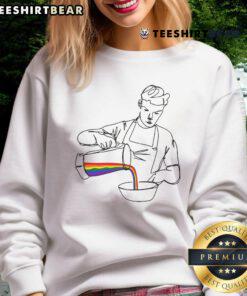 Will Poulter wearing the official X Choose Love Bear charity sweatshirt, promoting compassion and support for those in need.
