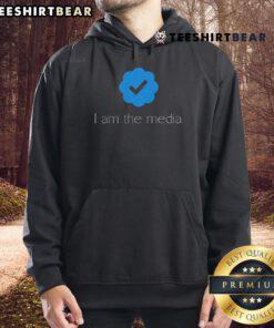 Premium 'I Am The Media' hoodie with social media verified check mark badge design, perfect for influencers and media enthusiasts.