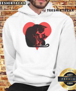 Pretty cat mum cuddling her adorable kitten, showcasing love for cat lovers on a cozy hoodie design.