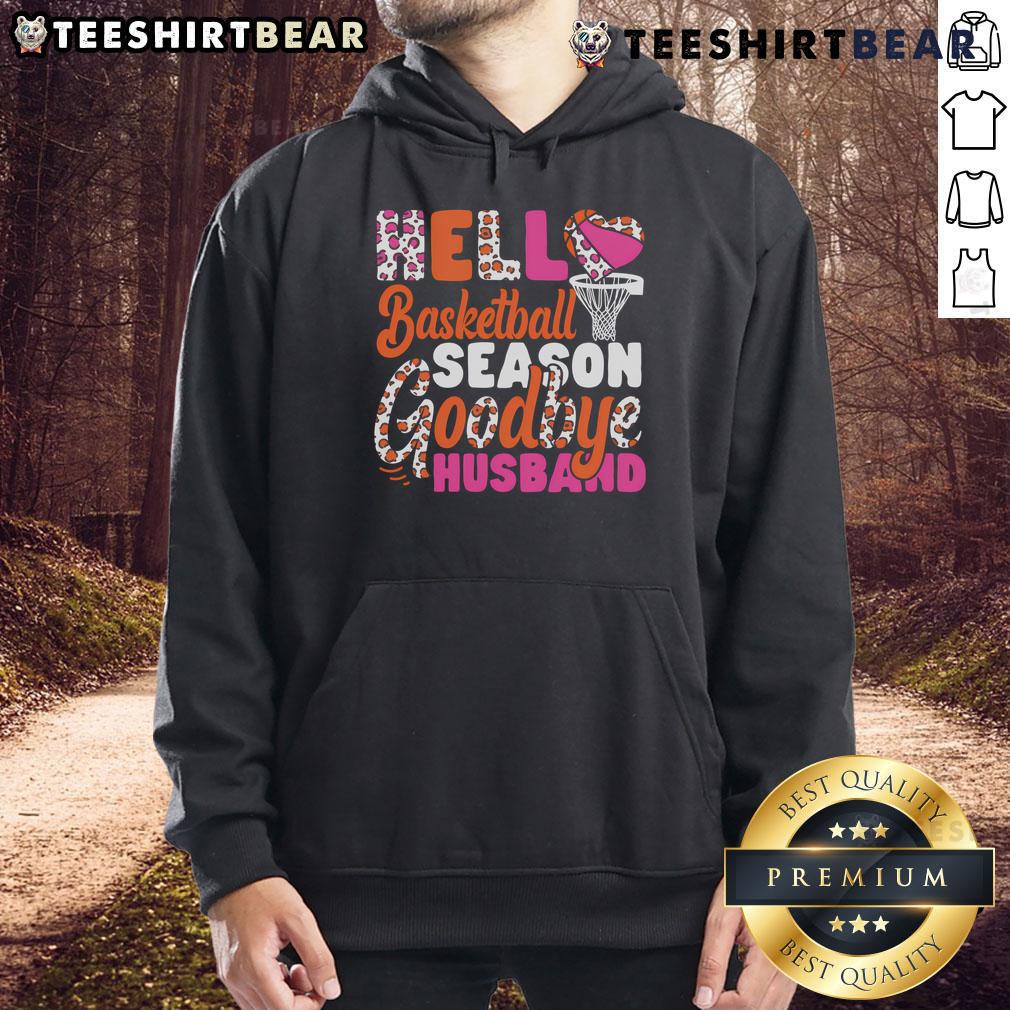 Couple wearing matching 'Hello Basketball Season' hoodies, celebrating their love for basketball together.