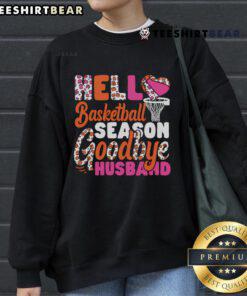 Couple wearing 'Hello Basketball Season' sweatshirt, celebrating their love for basketball together this season.