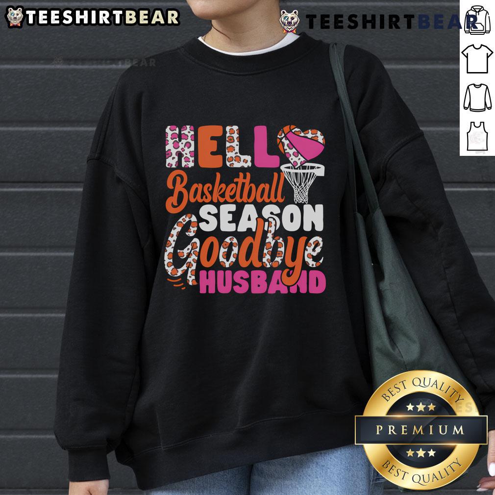 Couple wearing 'Hello Basketball Season' sweatshirt, celebrating their love for basketball together this season.