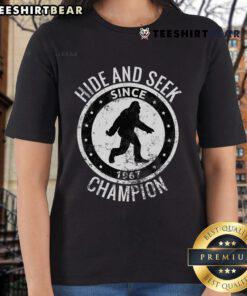 Top Hide and Seek Champion Bigfoot Sasquatch Since 1967 Ladies Tee showcasing a playful design featuring a mythical creature.
