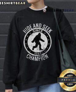 Cozy sweatshirt featuring Bigfoot, the Top Hide and Seek Champion since 1967, perfect for fans of Sasquatch and outdoor fun.
