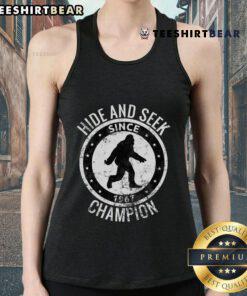 Top Hide and Seek Champion Bigfoot Sasquatch since 1967 tank top design featuring a playful Bigfoot illustration.