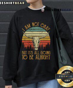 Alt Text: Vintage sunset sweatshirt featuring I'm Not Okay But It's Going To Be Alright text, perfect for country music fans.