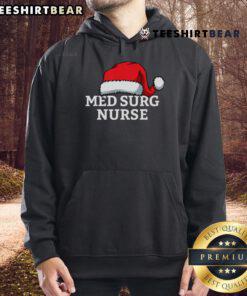 Alt Text: Top Med Surg Nurse wearing a Christmas Santa hat and hoodie, celebrating the holiday season in healthcare.