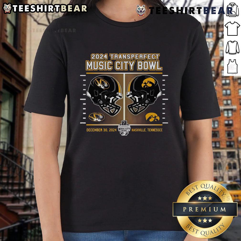 Alt Text: 2024 TransPerfect Music City Bowl football helmet design on a ladies tee featuring Mizzou Tigers vs Iowa Hawkeyes.