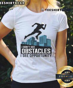 Awesome 'I Dont See Obstacles, I See Opportunity' freerunning parkour ladies tee featuring dynamic design and vibrant colors.