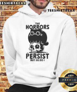 Cute cat in a skull hoodie with the text The Horror Persist, But So Do I, showcasing a playful and edgy style.